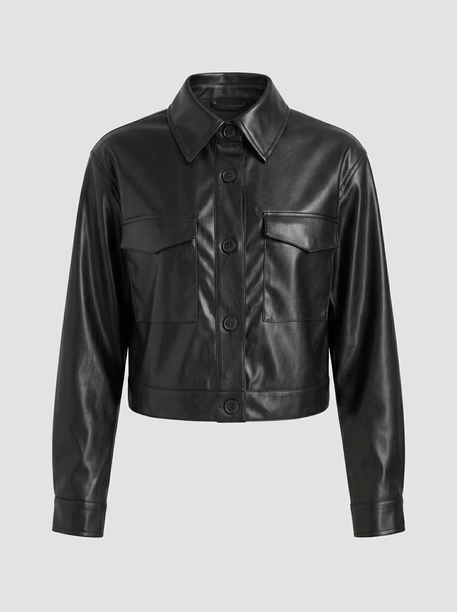 A black faux leather cropped jacket with a pointed collar, button-up front, and two flap chest pockets, shown on a neutral light gray background.